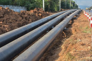 Gas,Pipes,And,Working,Excavator,For,Fuel,Transportation,Between,Cities. Gas,Pipes,And,Working,Excavator,For,Fuel,Transportation,Between,Cities.